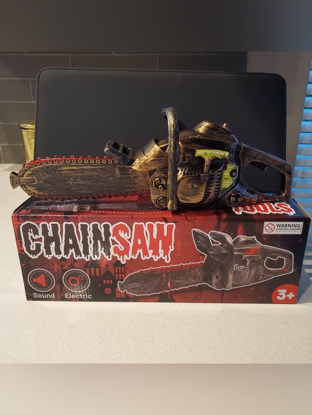 New. 16" Bloody Rusty Electric Chainsaw - Battery Operated fake chainsaw